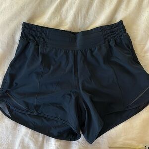 LULULEMON high rise hotty hot shorts 6 TALL 4” inseam. 12” rise. Like new!! Navy